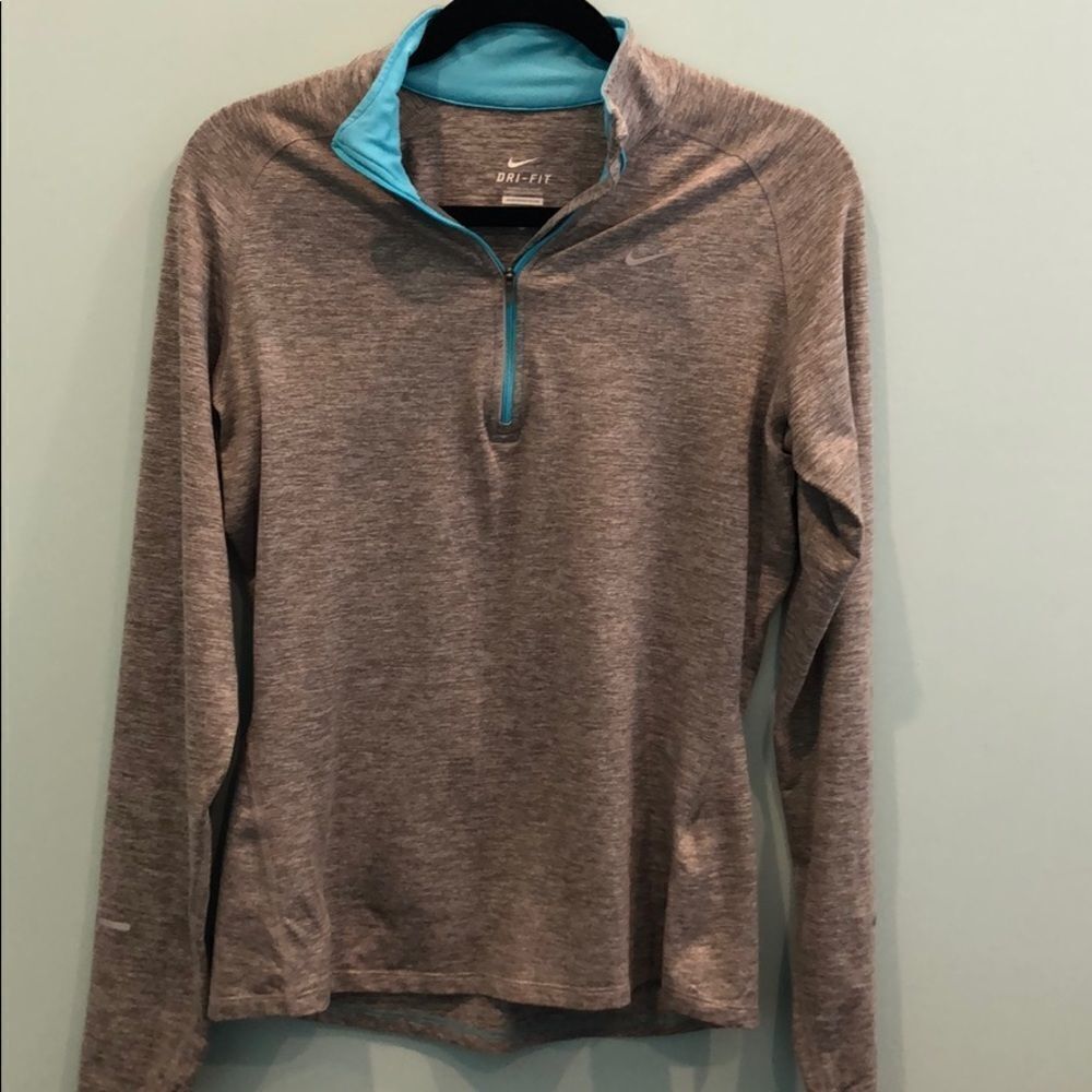 Nike Dri Fit long sleeved 1/4 Zip size med